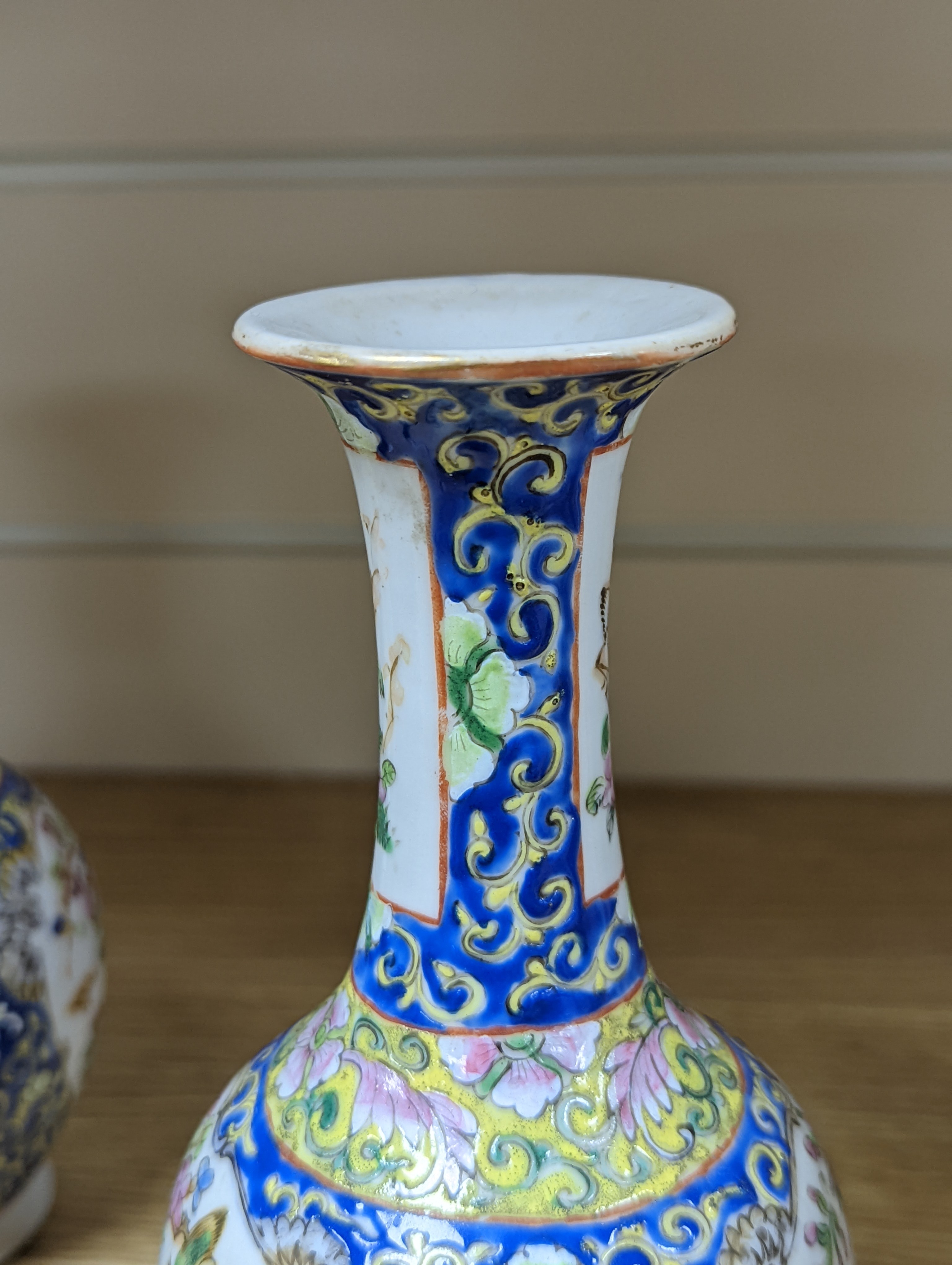 Four 19th century Chinese famille rose vases, 21cm